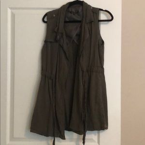 Khaki colored utility vest